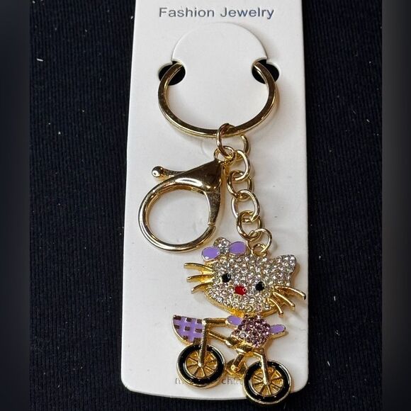 Mint BAG CHARM Sparkly Cat on Bicycle Keychain/Purse Charm Purple - Picture 1 of 11